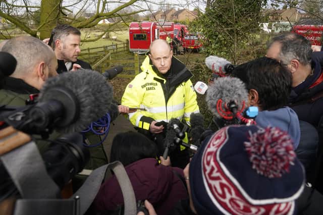 Peter Faulding (centre) CEO of private underwater search and recovery company Specialist Group International (SGI), speaks to the media in St Michael's on Wyre, Lancashire (Image: PA)