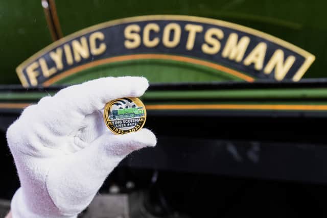 A collectable £2 coin at East Lancashire Railway in Bury ahead of its release by The Royal Mint, in collaboration with the National Railway Museum (part of the Science Museum Group) to celebrate the centenary of the world's most famous locomotive, the Flying Scotsman.