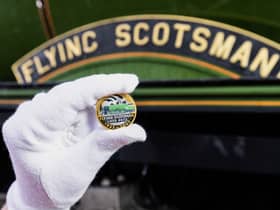 A collectable £2 coin at East Lancashire Railway in Bury ahead of its release by The Royal Mint, in collaboration with the National Railway Museum (part of the Science Museum Group) to celebrate the centenary of the world's most famous locomotive, the Flying Scotsman.