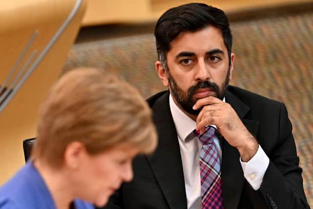 Humza Yousaf MSP Health Secretary is the husband of Nadia El-Nakla, here he is pictured listening to Scotland's First Minister and leader of the Scottish National party, Nicola Sturgeon, updating MSP's in any changes to coronavirus restrictions in the Scottish Parliament Building on September 08, 2021 in Edinburgh, Scotland. (Photo by Jeff J Mitchell-Pool/Getty Images)