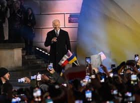 Joe Biden arrives to deliver a speech at the Royal Castle Arcades on February 21, 2023 in Warsaw, Poland