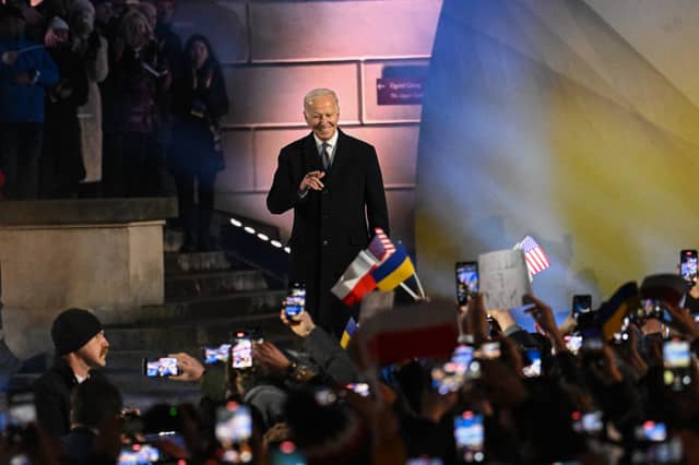 Joe Biden arrives to deliver a speech at the Royal Castle Arcades on February 21, 2023 in Warsaw, Poland