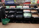 Empty fruit and vegetable shelves at an Asda in east London
