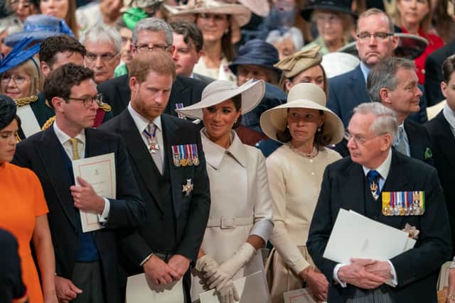Meghan Markle and Prince Harry sat next to Princess Eugenie and husband Jack Brooksbank at the National Service of Thanksgiving for the Queen Elizabeth 11 Platinum Jubilee. Photograph by Getty