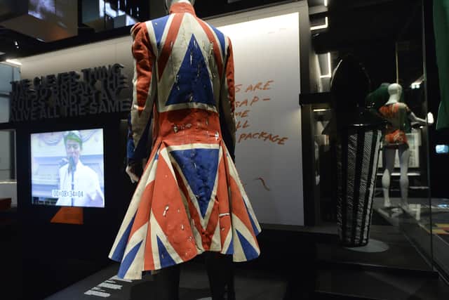 The Union Jack coat created by British fashion designer Alexander McQueen and used by David Bowie, during a press preview of an exhibition dedicated to the British singer at the Philarmonie in Paris (Credit: AFP via Getty Images)