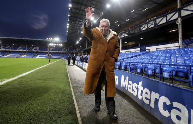 John Motson waves to fans after a Premier League match between Everton and Crystal Palace at Goodison Park in 2018 (Photo: Steve Welsh/Getty Images)