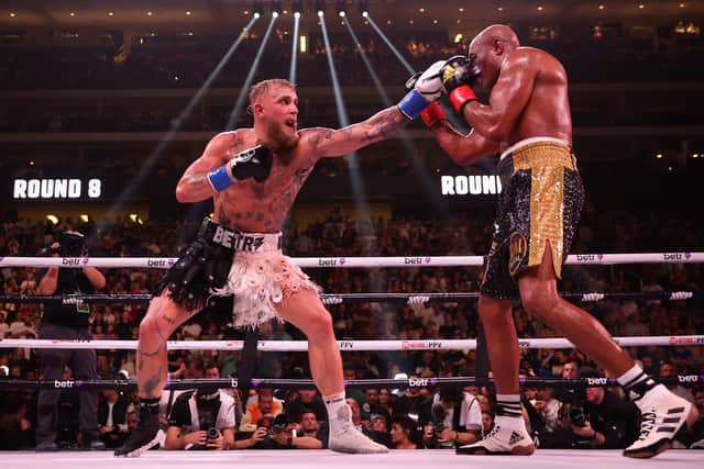 Jake Paul throws a left on Anderson Silva of Brazil during their cruiserweight bout at Desert Diamond Arena on October 29, 2022 in Glendale, Arizona. (Photo by Christian Petersen/Getty Images)