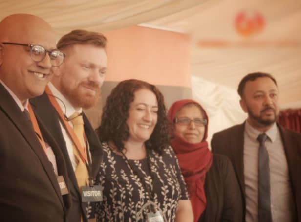 Luke Sullivan (second from left) with Baroness Uddin (second from right) (Photo: Phoenix Community Capital/Medium)