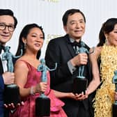 Actors Michelle Yeoh, Ke Huy Quan, Stephanie Hsu, Jamie Lee Curtis and James Hong pose with the award for Outstanding Performance by a Cast in a Motion Picture for "Everything Everywhere All at Once" during the 29th Screen Actors Guild Awards at the Fairmont Century Plaza in Century City, California, on February 26, 2023. (Photo by Frederic J. Brown / AFP) (Photo by FREDERIC J. BROWN/AFP via Getty Images)