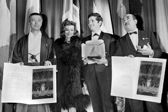 Hiroshi Teshigahara (far left) at the 1964 Cannes Film Festival (Credit: Getty Images)