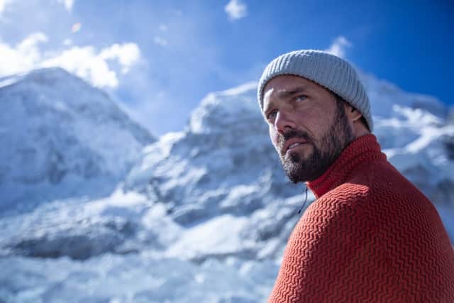 Spencer Matthews in Finding Michael, with Mount Everest looming behind him (Credit: Disney+)