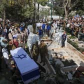 Mourners attend the funeral of two Israeli settlers who were shot dead in West Bank. (Credit: Getty Images)