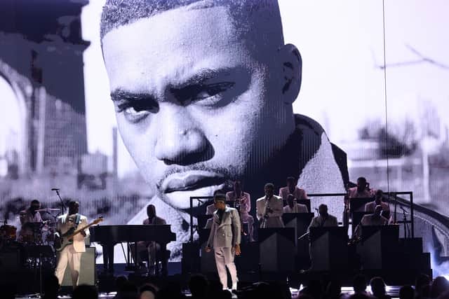 Nas (C) performs onstage during the 64th Annual GRAMMY Awards at MGM Grand Garden Arena on April 03, 2022 in Las Vegas, Nevada. (Photo by Rich Fury/Getty Images for The Recording Academy)