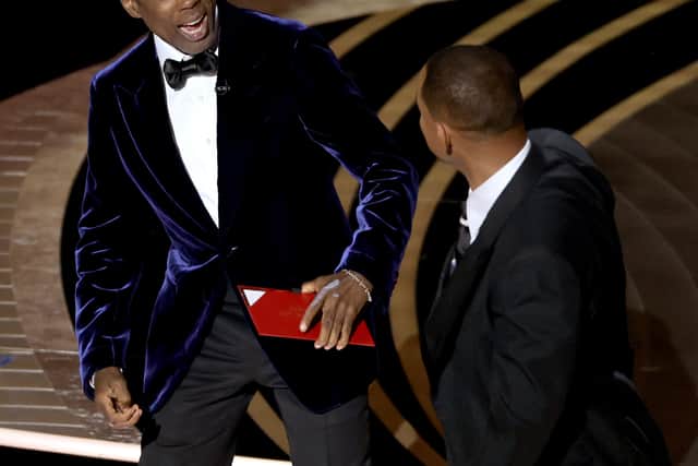 Will Smith appears to slap Chris Rock onstage during the 94th Annual Academy Awards at Dolby Theatre on March 27, 2022 (Photo by Neilson Barnard/Getty Images)
