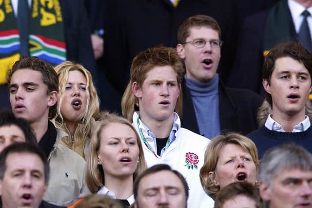 Prince Harry watches the Investec Challenge match between England and South Africa played at Twickenham in London, November 23, 2002. (Photo by David Rogers/Getty Images)