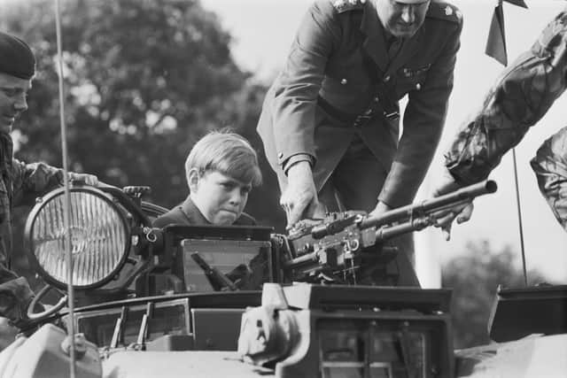 Prince Andrew attends a Battle Royal review of the troops of the Household Division at Long Valley, Aldershot, UK, 9th August 1971. (Photo by Les Lee/Daily Express/Getty Images)