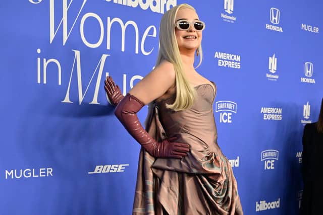 German singer-songwriter Kim Petras arrives for the 2023 Billboard Women in Music awards, dressed in a Vivienne Westwood design, at the YouTube theatre at Hollywood Park in Inglewood, California, March 1, 2023. (Photo by Frederic J. Brown / AFP) (Photo by FREDERIC J. BROWN/AFP via Getty Images)