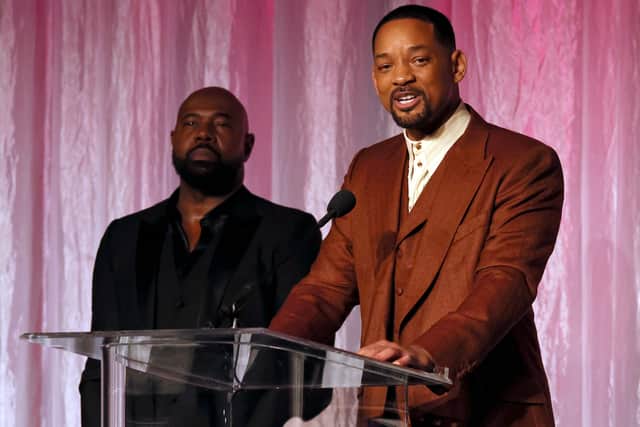  Honorees Antoine Fuqua and Will Smith accept The Beacon Award for "Emancipation" onstage during the 14th Annual AAFCA Awards at Beverly Wilshire California. (Photo by Jemal Countess/Getty Images)