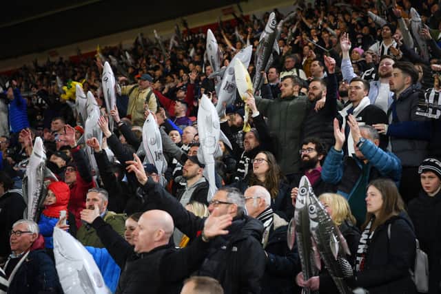 Grimsby Town fans with their Harry Haddocks