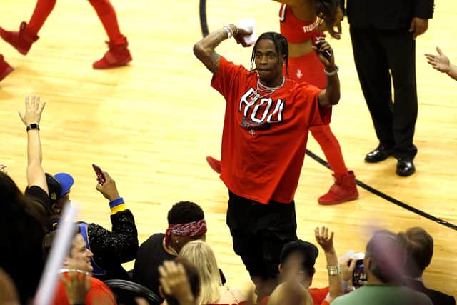 Rapper Travis Scott throws a t-shirt in to the crowd in Game One of the Western Conference Finals of the 2018 NBA Playoffs between the Houston Rockets and the Golden State Warriors at Toyota Center on May 14, 2018 in Houston, Texas (Credit: Getty Images)