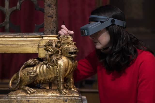 Conservator Krista Blessley works on the restoration of a coronation chair, at Westminster Abbey in London, ahead of the upcoming coronation of King Charles III. (Pic PA)