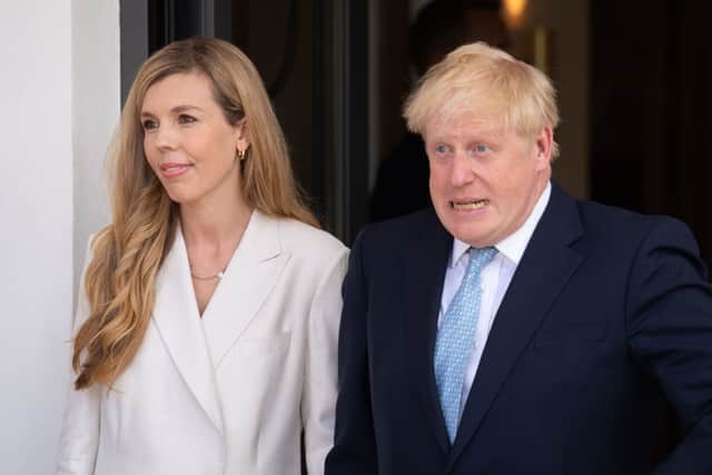 British Prime Minister Boris Johnson and wife Carrie Johnson arrive for the official welcome ceremony on the first day of the three-day G7 summit at Schloss Elmau on June 26, 2022 near Garmisch-Partenkirchen, Germany. (Photo by Stefan Rousseau - Pool/Getty Images)
