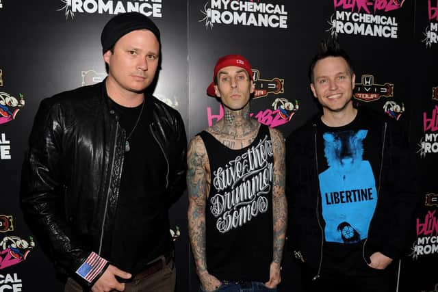 Blink 182 Musicians Tom DeLonge, Travis Barker and Mark Hoppus  pose at a press party of announce the 2011 Honda Civic Tour featuring blink-182  (Photo by Kevin Winter/Getty Images)