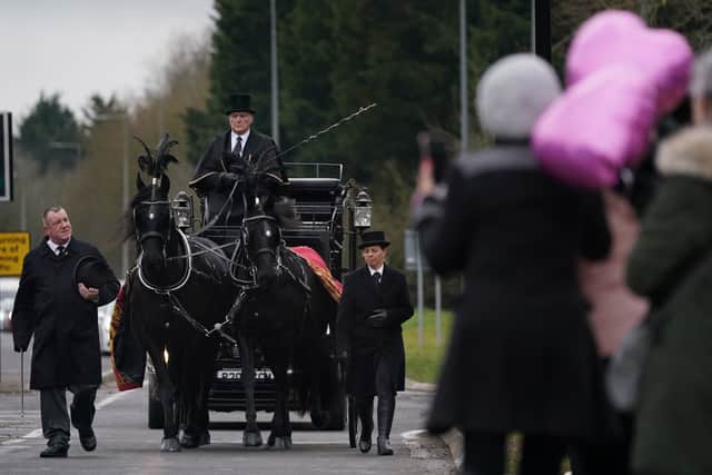 A private service was held for friends and family following the procession. (Credit: PA)