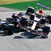 Max Verstappen (R) and Lewis Hamilton crash in Monza, Italy, September 2021