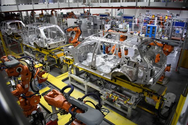 Parts supply and workforce problems have severely affected new car production in recent years, hurting the used car market (Photo by Leon Neal/Getty Images)