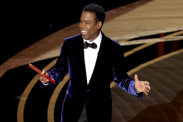 Chris Rock speaks onstage during the 94th Annual Academy Awards at Dolby Theatre 