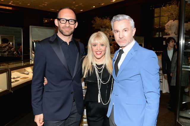 (L-R)  Richard Moore, Vice President Creative & Visual Merchandising at Tiffany & Co., Catherine Martin, Academy Award winning costume and production designer and Baz Luhrmann, director/producer/co-writer of "The Great Gatsby" attend the unveiling of Tiffany's Fifth Avenue windows celebrating Jazz Age glamour, evoking the spirit of Baz Luhrmann's highly anticipated adaptation of "The Great Gatsby" on April 17, 2013 in New York City.  (Photo by Andrew H. Walker/Getty Images for Tiffany & Co.)