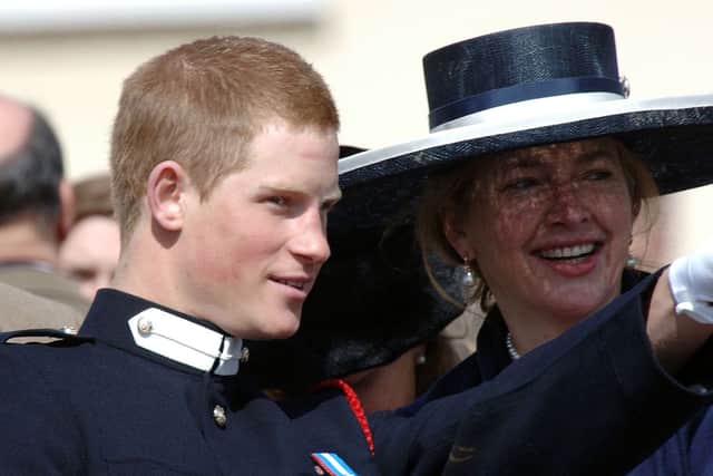 Prince Harry talks to his former nanny Tiggy Legge-Bourke at his passing-out Sovereign's Parade at Sandhurst Military Academy on April 12, 2006 in Sandhurst, England. (Photo by Anwar Hussein/Getty Images)