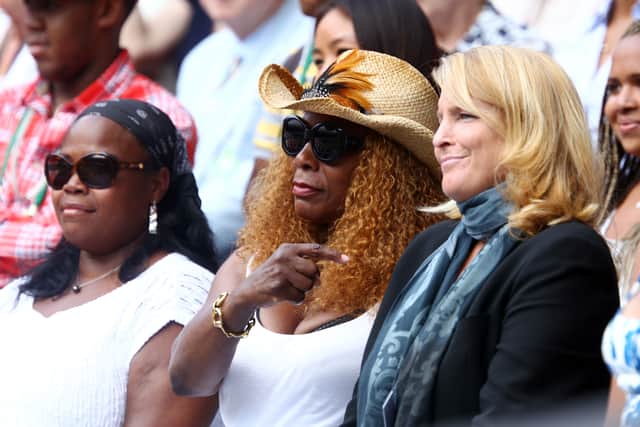 Oracene Price, the mother of the Williams sisters (C) and agent Jill Smoller (R) during the Ladies Singles Final match between Vera Zvonareva and Serena Williams on Day Twelve of the Wimbledon Lawn Tennis Championships at the All England Lawn Tennis and Croquet Club on July 3, 2010 in London, England.  (Photo by Julian Finney/Getty Images)