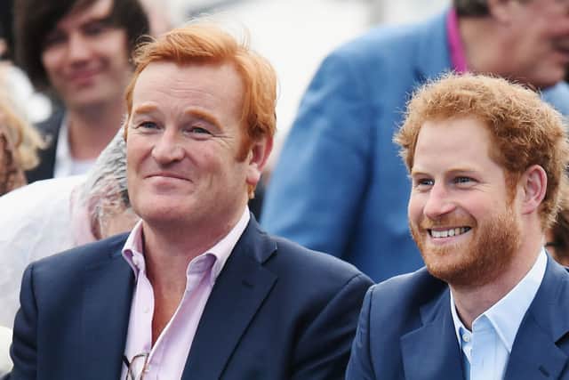 Britain's Prince Harry (R), alongside former Royal Equerry Mark Dyer, smiles as he attends the Sentebale Concert at Kensington Palace in central London on June 28, 2016 in London. AFP PHOTO / POOL / Dominic Lipinski (Photo credit: DOMINIC LIPINSKI/AFP via Getty Images)