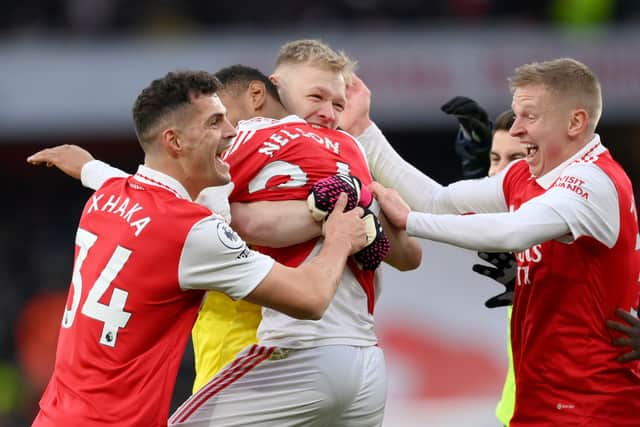 Arsenal celebrate the winning goal from Reiss Nelson