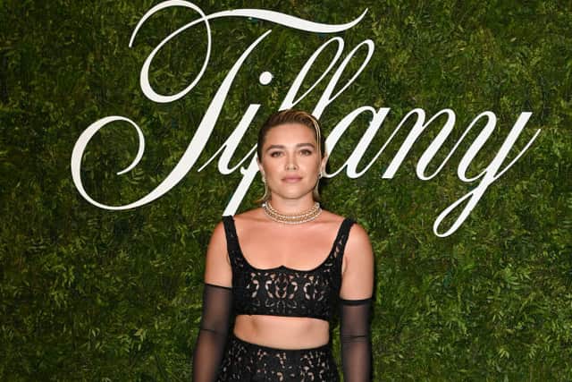 Florence Pugh always nails crop tops on the red carpet. (Photo by Kate Green/Getty Images)