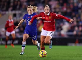 Alessia Russo of Manchester United is challenged by Erin Cuthbert of Chelsea. Picture: Nathan Stirk/Getty Images