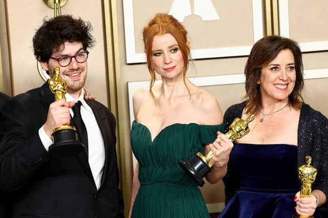 (L-R) Daniel Roher, Odessa Rae and Diane Becker, winners of the Best Documentary Feature award award for “Navalny,” pose in the press room during the 95th Annual Academy Awards on March 12, 2023 in Hollywood, California. (Photo by Arturo Holmes/Getty Images )