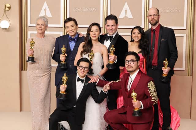 Jamie Lee Curtis, James Hong, Ke Huy Quan, Michelle Yeoh, Jonathan Wang, Daniel Kwan, Stephanie Hsu, and Daniel Scheinert, winners of the Best Picture award for Everything Everywhere All at Once, pose in the press room during the 95th Annual Academy Awards at Ovation Hollywood on March 12, 2023 in Hollywood, California. (Photo by Rodin Eckenroth/Getty Images)