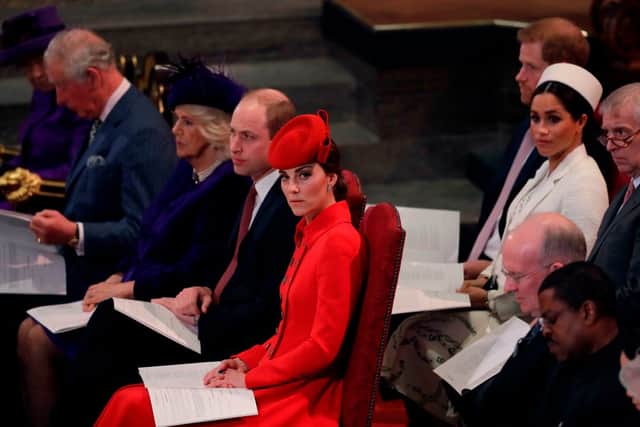 Britain's Prince Charles, Prince of Wales, Britain's Camilla, Duchess of Cornwall, Britain's Prince William, Duke of Cambridge, and Britain's Catherine, Duchess of Cambridge, with (L-R second row) Britain's Prince Harry, Duke of Sussex, Britain's Meghan, Duchess of Sussex and Britain's Prince Andrew, Duke of York, are seated as they attend the Commonwealth Day service at Westminster Abbey in London on March 11, 2019. Photo by Kirsty Wigglesworth - WPA Pool/Getty Images.