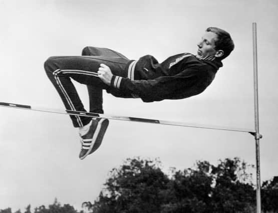 American high jump champion Dick Fosbury clears the bar during practice, on October 10, 1968 in Mexico (Photo by -/EPU/AFP via Getty Images)