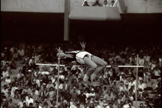 1968:  Dick Fosbury of the USA clears the bar in the high jump competition with his dramatic new jumping style (Photo by Tony Duffy /Allsport)