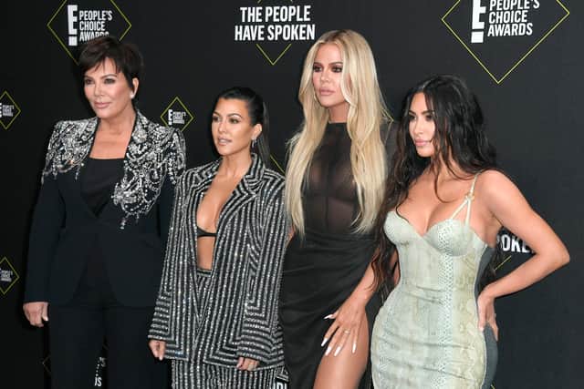 Kris Jenner, Kourtney Kardashian, Khloe Kardashian, and Kim Kardashian West attend the 2019 E! People's Choice Awards at Barker Hangar (Getty) 