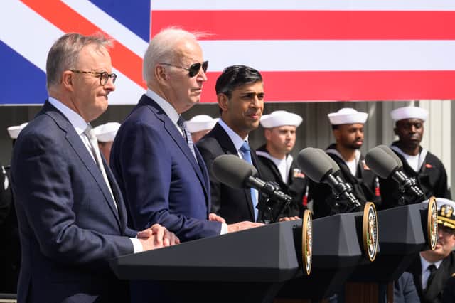 Anthony Albanese, Joe Biden and Rishi Sunak have signed off on a security pact to deliver nuclear-powered submarines to the Indo-Pacific region amid rising China-Taiwan tensions. (Credit: Getty Images)