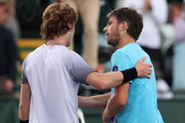 Norrie and Rublev embrace after Norrie wins last 16 match