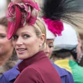 Zara Phillips watches the horses in the parade ring on Ladies Day at the Cheltenham Racecourse