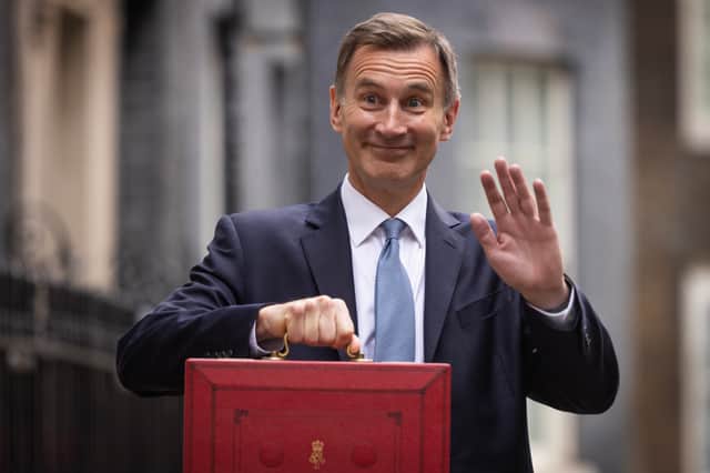 UK Chancellor Jeremy Hunt leaves Downing Street with the despatch box to present his spring budget to parliament on March 15, 202 (Photo by Dan Kitwood/Getty Images)