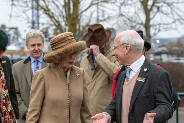 Camilla, Queen Consort and Ian Renton arrive at the track during day two of the Cheltenham Festival 2023 at Cheltenham Racecourse on March 15, 2023 in Cheltenham, England. (Photo by Shane Anthony Sinclair/Getty Images)