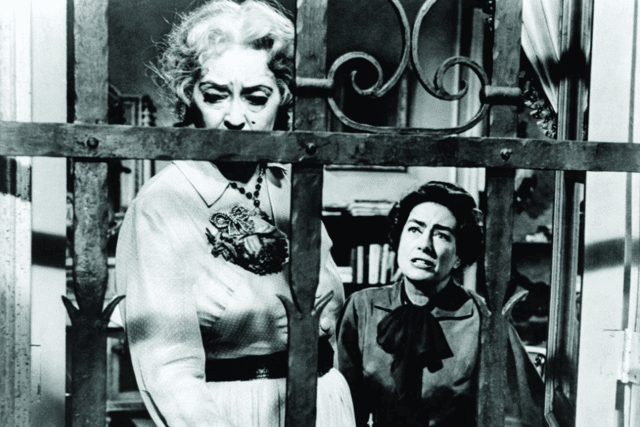 Bette Davis and Joan Crawford in Whatever Happened to Baby Jane? (Credit: Warner Bros.)